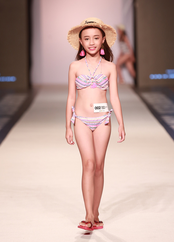 Thí sinh Nguyễn Từ Thiện Duyên trải qua các vòng thi trình diễn bikini, váy tự chọn.