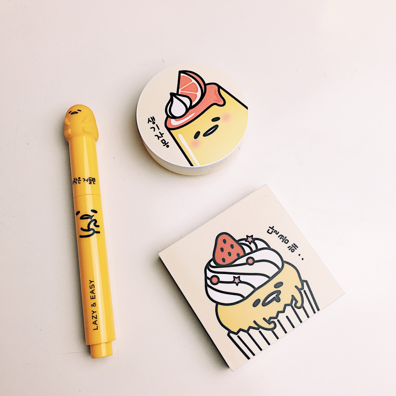 Kết quả hình ảnh cho Holika Holika Gudetama Lazy & Easy Melting Lip button