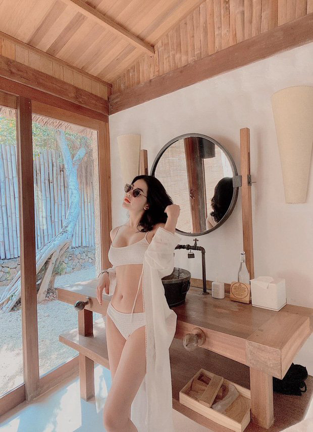 Vợ cũ Việt Anh tung loạt ảnh diện bikini body cực nuột, phản ứng bất ngờ khi được khen hơn cả Ngọc Trinh - Ảnh 2.