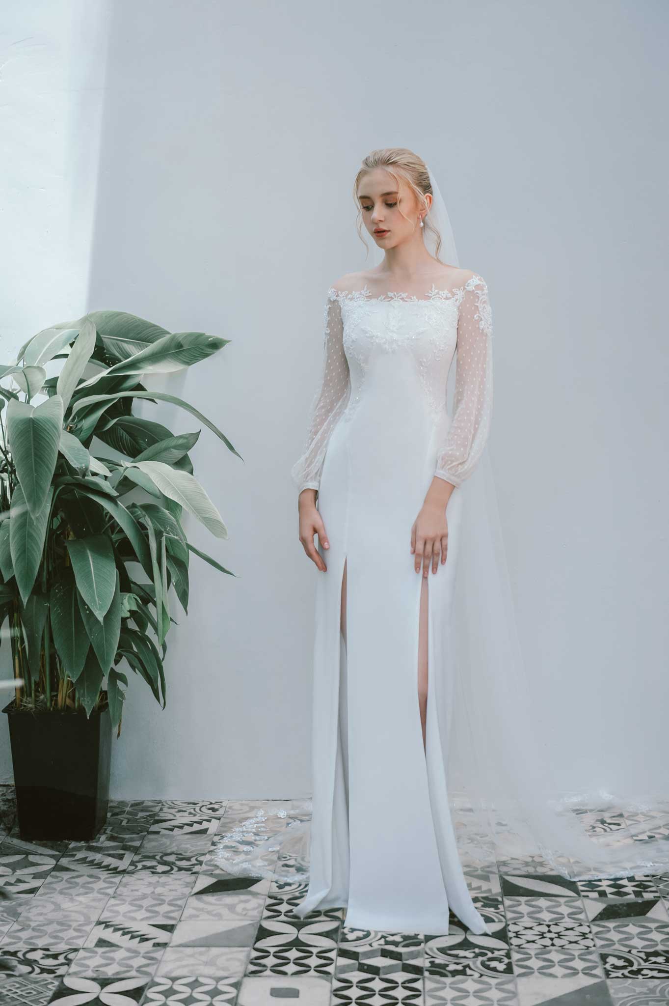 Váy cưới tay phồng màu trắng của NTK Trương Thanh Hải